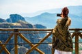 Woman is wearing a skirt and scarf in Meteora Monastery Royalty Free Stock Photo